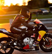 yellow porsche gt3 and yatch